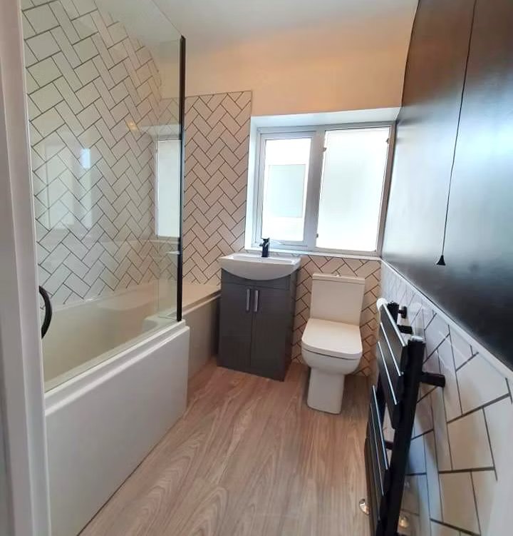 Herringbone tiled bathroom